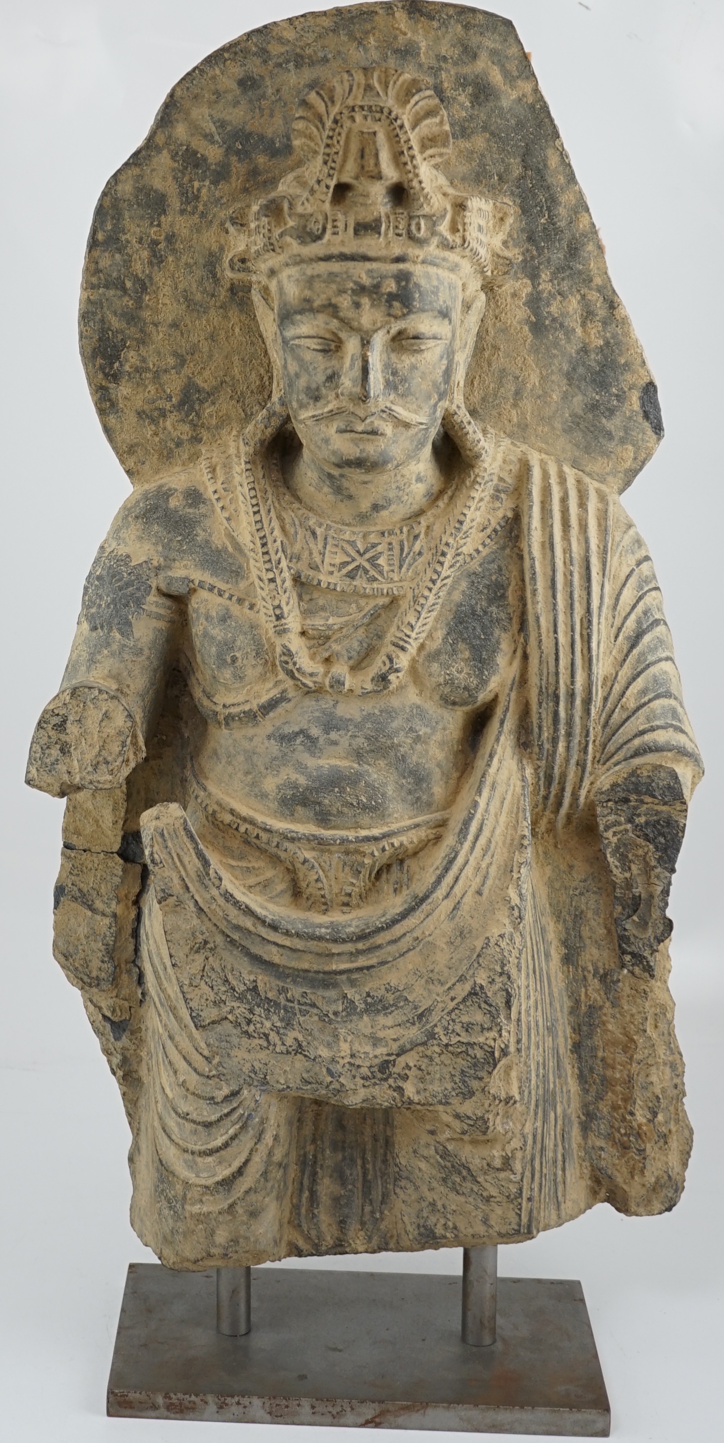 A large grey schist Bodhisattva figure, Gandhara, 2nd/3rd century A.D.